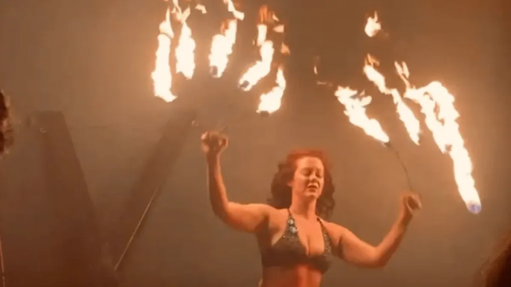 Fire performer on stage at The Woodshed Orlando during a themed show