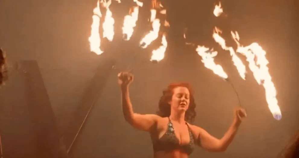 Fire performer on stage at The Woodshed Orlando during a themed show