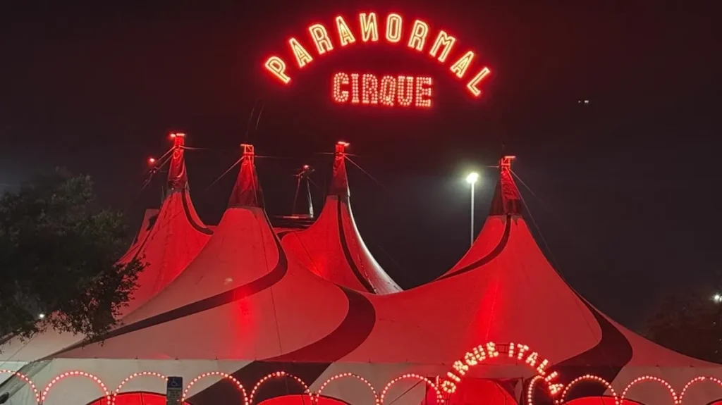Paranormal Cirque II red-and-black tent circus performance in Oviedo, Fl.