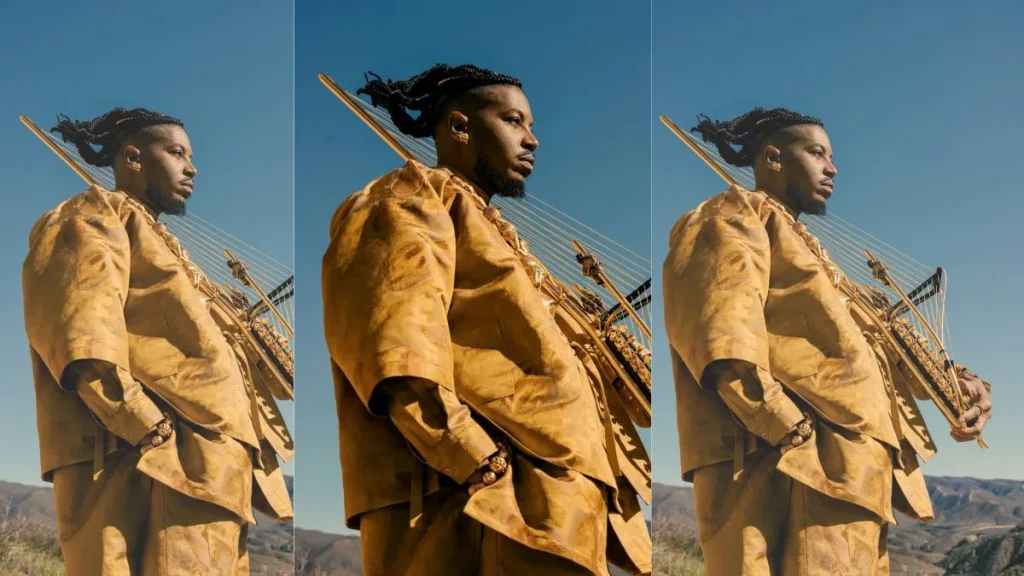 Chief Adjuah holding one of his custom Adjuah horns in a promotional portrait