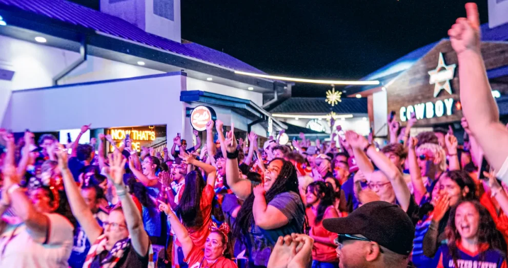 Supporters celebrate a U.S. goal at Pointe Orlando's FIFA World Cup watch party.