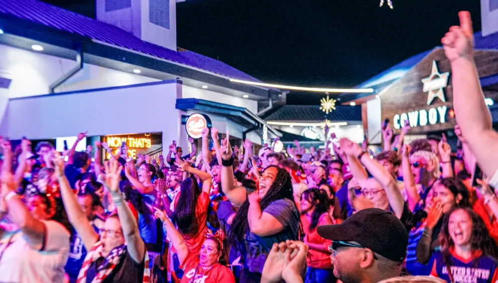 Supporters celebrate a U.S. goal at Pointe Orlando's FIFA World Cup watch party.