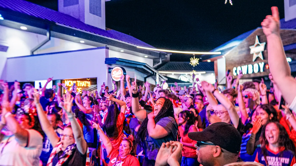 Supporters celebrate a U.S. goal at Pointe Orlando's FIFA World Cup watch party.