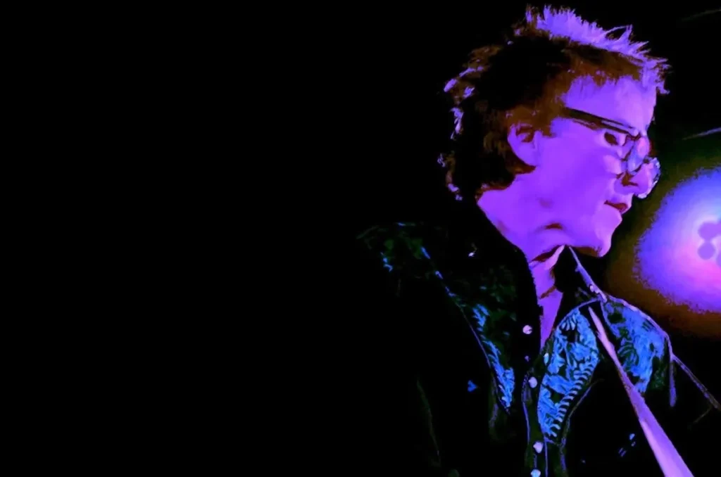 Punk Rocker Tommy Stinson playing guitar.