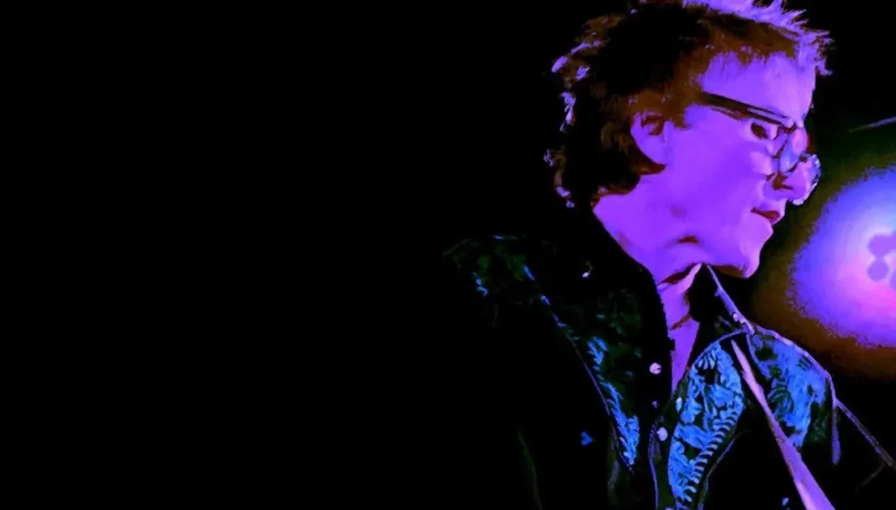 Punk Rocker Tommy Stinson playing guitar.